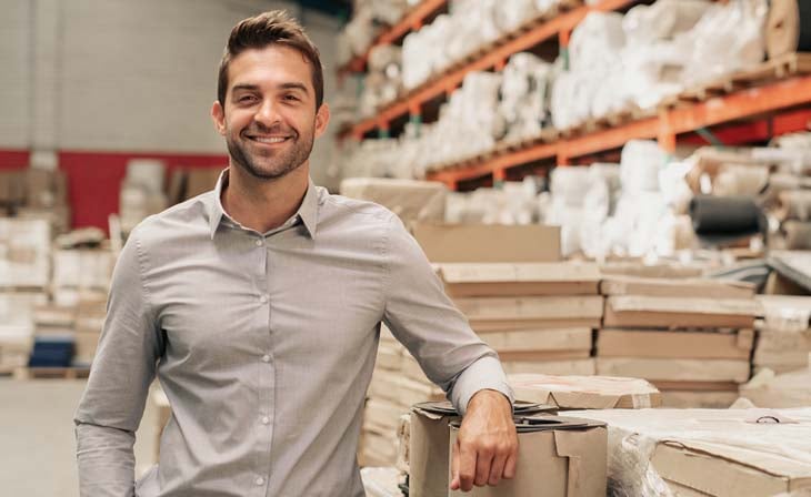 owner standing in warehouse